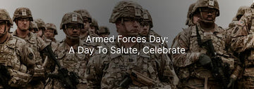 Group of uniformed soldiers standing in formation, wearing helmets and tactical gear, with the text “Armed Forces Day: A Day To Salute, Celebrate”