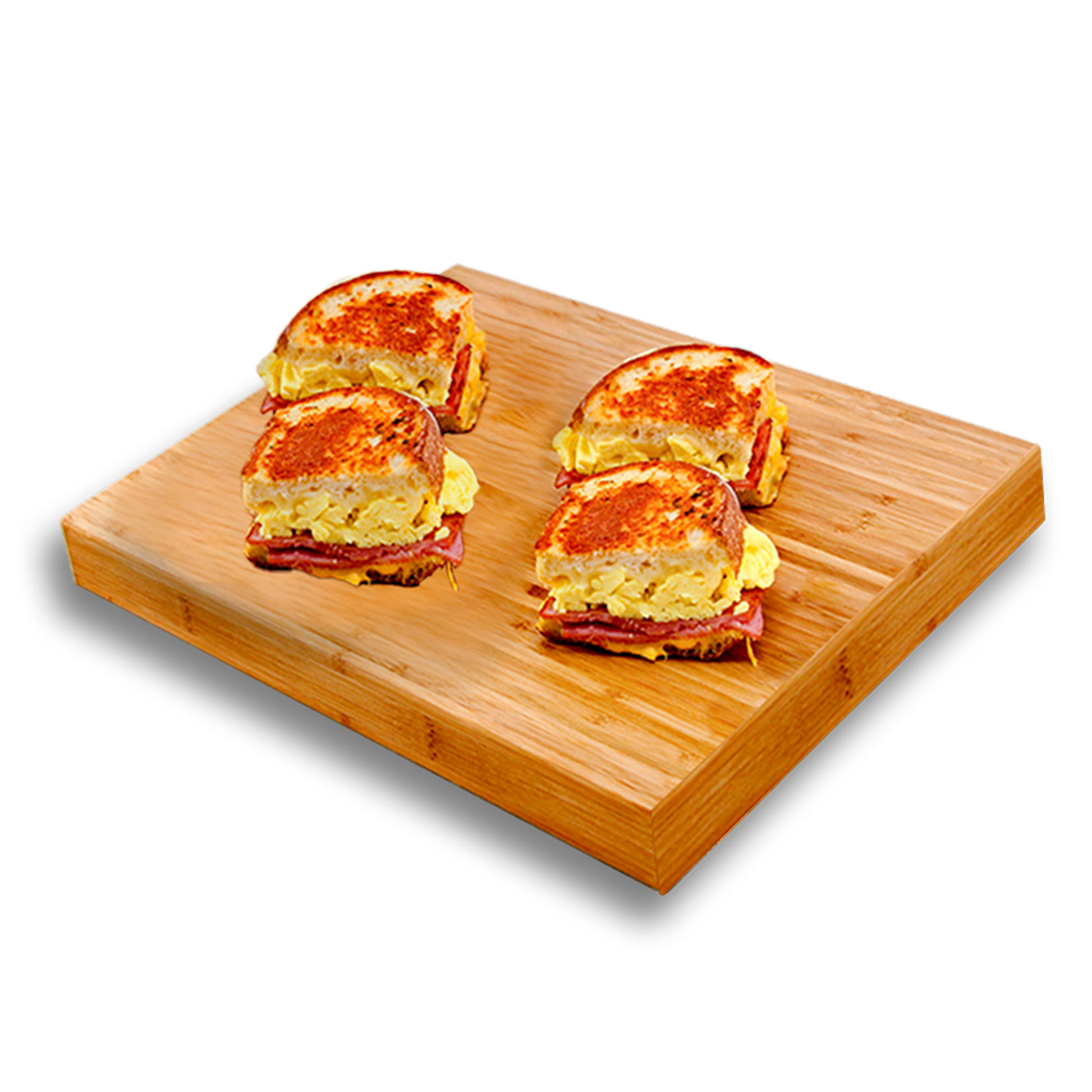 Grilled sandwiches on a wooden board, filled with scrambled eggs, ham, and cheese.